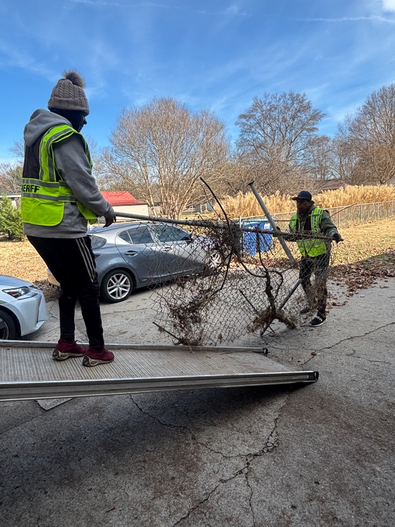 Crew removing debris